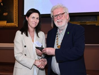 The Dean of the Faculty of Public Health Medicine awards a prize at the Summer Scientific Meeting 2026